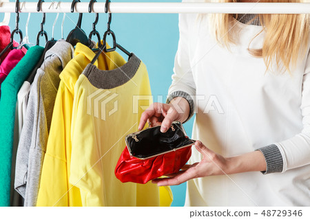 Human with empty wallet purse. Lack of money. 48729346