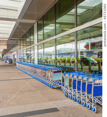 luggage carts by airport entrance luggage carts by airport entrance 48731060