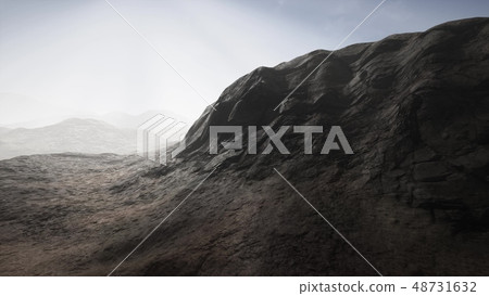 Sun Rays over Mountains in a Valley Sun Rays over Mountains in a Valley 48731632