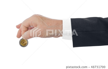 Hand with euro coin Hand with euro coin 48731700