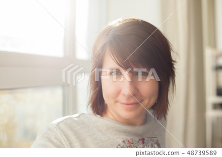 Caucasian girl with brown hair happy smiles. Caucasian girl with brown hair happy smiles. 48739589