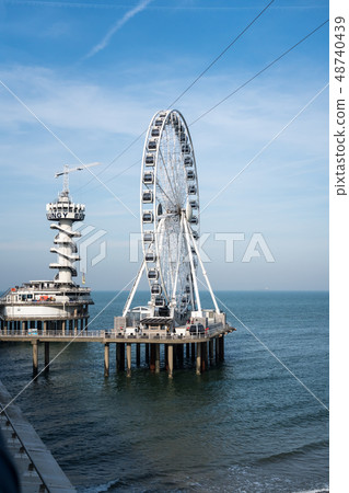 ferris wheel by the sea ferris wheel by the sea 48740439