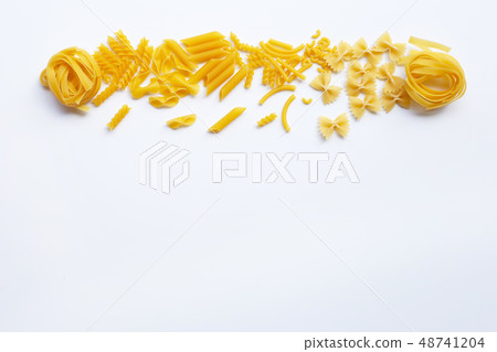 Different types of dry pasta on white. Different types of dry pasta on white. 48741204