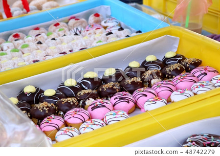 Sweet donuts at street food Sweet donuts at street food 48742279