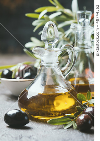 Olive oil and olive branch Olive oil and olive branch 48744362