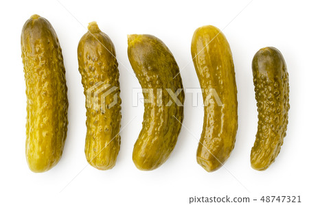 Set of pickled cucumbers of different shapes on a Set of pickled cucumbers of different shapes on a 48747321