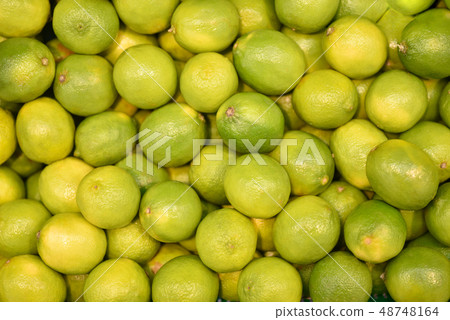 Food fruit fresh green limes, background. Food fruit fresh green limes, background. 48748164