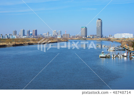 Overlooking the residential area of Motogo Kawaguchi where the blue sky spreads out from Shikahama Bridge 48748714