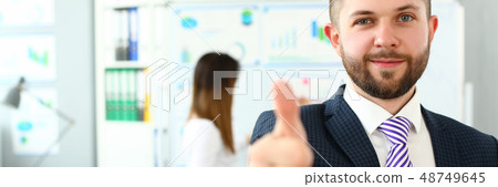 Male arm show OK or confirm during conference in office 48749645