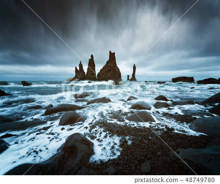 Reynisdrangar cliffs near the Vik town, Iceland Reynisdrangar cliffs near the Vik town, Iceland 48749780