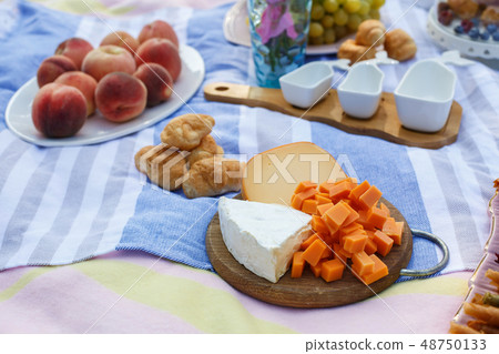 wooden tray with cheese assorti, pastillum rolls wooden tray with cheese assorti, pastillum rolls 48750133