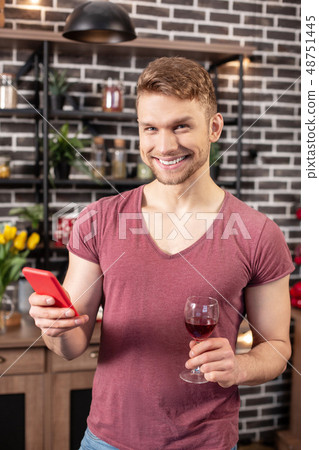 Bearded husband feeling excited before romantic dinner with his woman 48751445