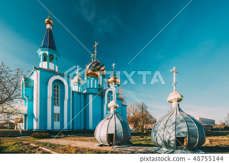 Village Krasnoe, Gomel Region, Belarus. Old Orthodox Church Of The Assumption At Sunny Spring Day Village Krasnoe, Gomel Region, Belarus. Old Orthodox Church Of The Assumption At Sunny Spring Day 48755144