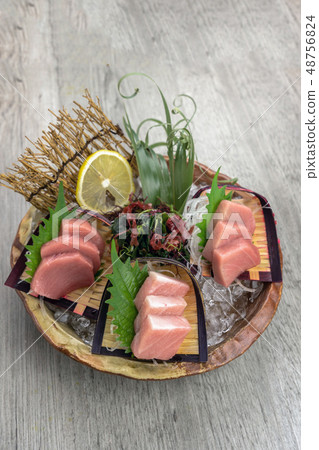 Top view of tuna sashimi set include Otoro, Chutoro and Akami with ice on the table, Luxury Japanese food concept Top view of tuna sashimi set include Otoro, Chutoro and Akami with ice on the table, Luxury Japanese food concept 48756824