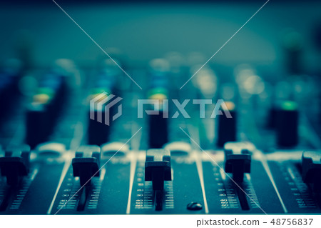 Closeup some part of audio mixer, vintage film style, music equipment concept 48756837