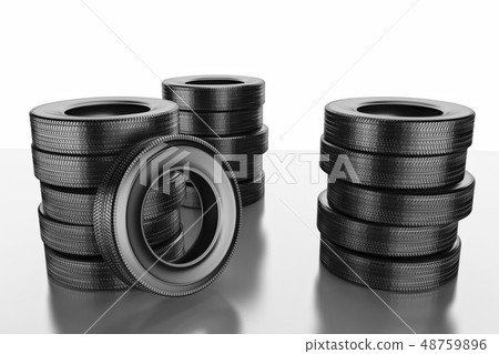New winter tires with a modern tread on the black background. 48759896