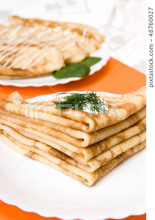 a stack of Russian pancakes a stack of Russian pancakes 48760027