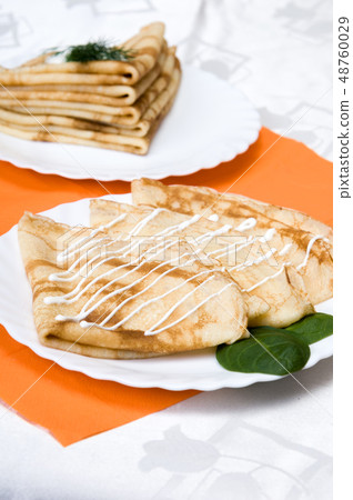 a stack of Russian pancakes a stack of Russian pancakes 48760029