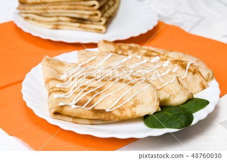 a stack of Russian pancakes a stack of Russian pancakes 48760030