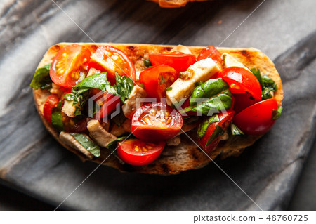 Traditional Italian bruschettas Traditional Italian bruschettas 48760725