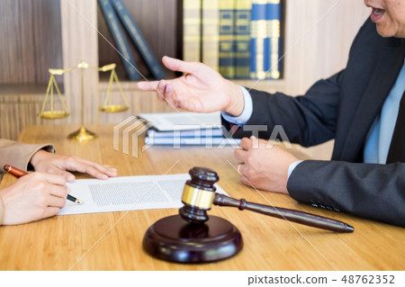 business people and lawyers discussing contract business people and lawyers discussing contract 48762352