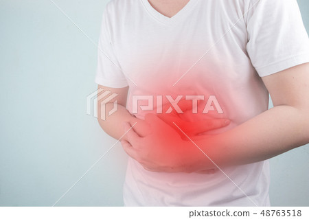 Asian Young men are suffering from stomach ulcers. 48763518