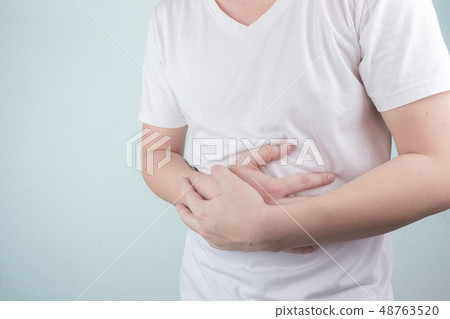 Asian Young men are suffering from stomach ulcers. 48763520