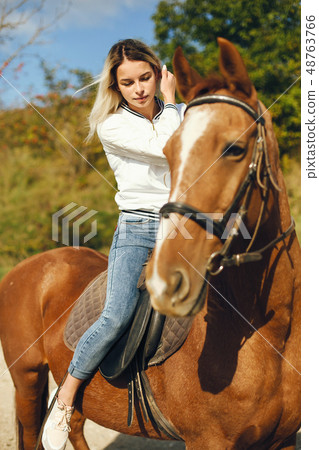 woman with horses woman with horses 48763766