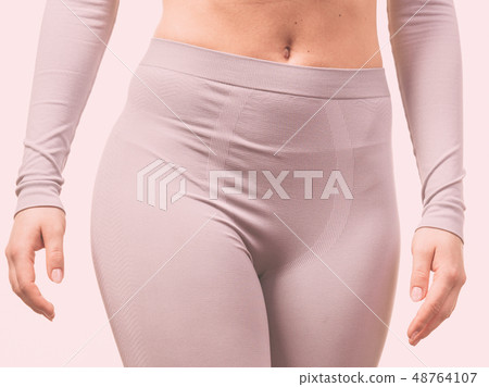 female hips wearing thermoactive underwear 48764107