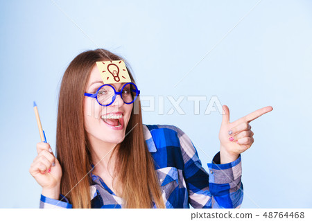 woman thinking light idea bulb on head, creative girl lots of ideas 48764468