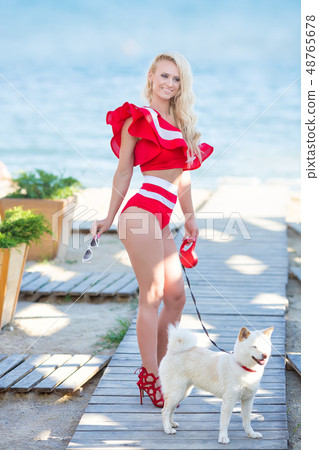 Sexy bikini body woman sun tanning relaxing Sexy bikini body woman sun tanning relaxing 48765678