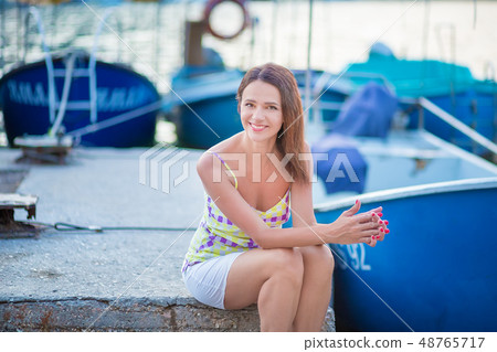 fashion model in lace dress outside posing fashion model in lace dress outside posing 48765717