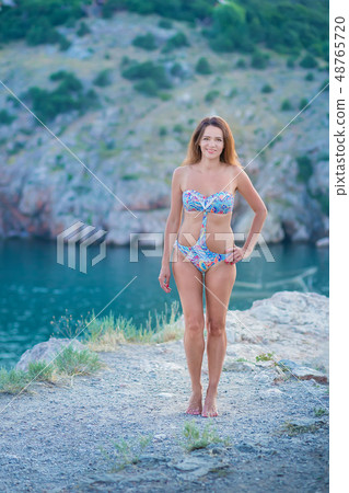 fashion model in lace dress outside posing fashion model in lace dress outside posing 48765720