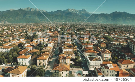 Low altitude aerial view of luxury villas and streets of Forte dei Marmi, Italy Low altitude aerial view of luxury villas and streets of Forte dei Marmi, Italy 48766504