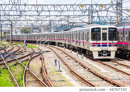 Takasu Fudo Station and train 48767330