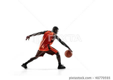 Full length portrait of a basketball player with ball 48770593