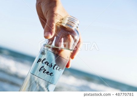 reusable water bottle with the text plastic free 48770781