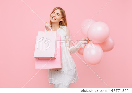 Happy young woman, in a white dress 48771821