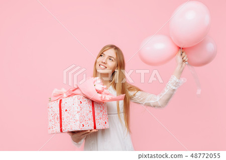 Happy young woman, in a white dress Happy young woman, in a white dress 48772055