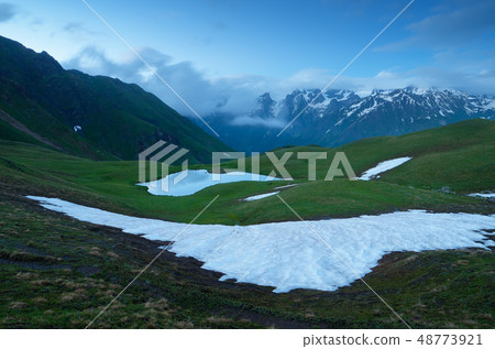 Snowfield in the mountains 48773921