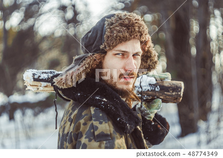 the man in the hat with earflaps the man in the hat with earflaps 48774349