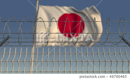 Blurred waving flag of Japan behind barbed wire fence. 3D rendering Blurred waving flag of Japan behind barbed wire fence. 3D rendering 48780465