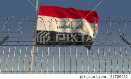 Barbed wire against waving flag of Iraq. 3D rendering Barbed wire against waving flag of Iraq. 3D rendering 48780482