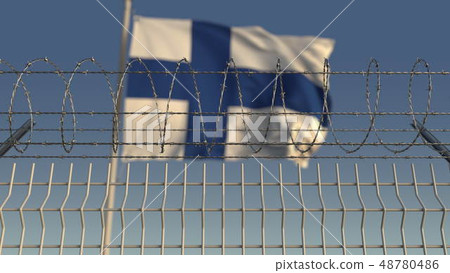 Barbed wire against waving flag of Finland. 3D rendering 48780486