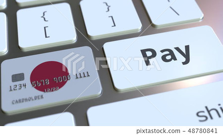 Bank card featuring flag of Japan as a key on a computer keyboard. Japanese online payment Bank card featuring flag of Japan as a key on a computer keyboard. Japanese online payment 48780841