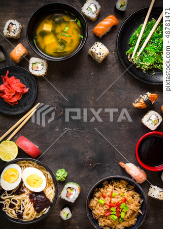 Sushi and japanese food on dark background Sushi and japanese food on dark background 48781471