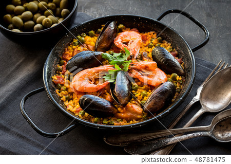 Paella on a table Paella on a table 48781475