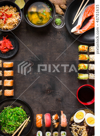 Sushi and japanese food on dark background Sushi and japanese food on dark background 48781635