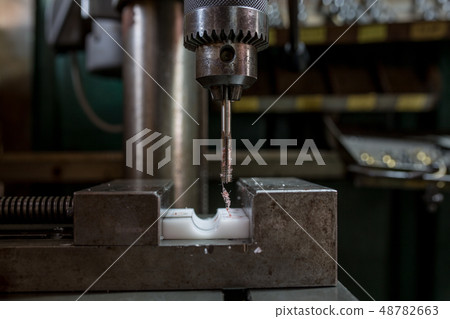 Drilling with a drilling machine 48782663