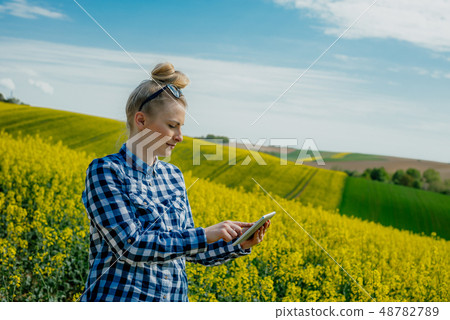 Female farmer using tablet 48782789